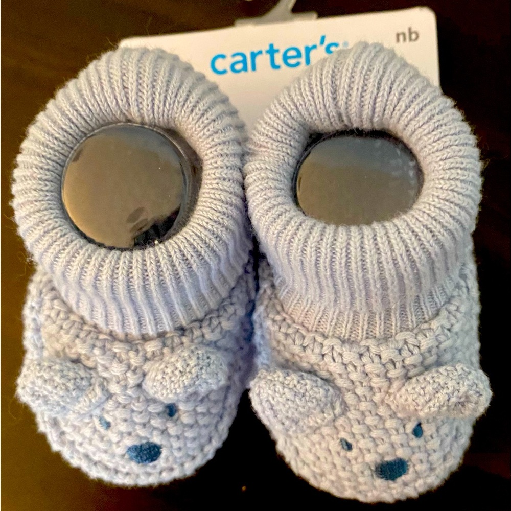 Carters baby slippers, Newborn size, light blue.
